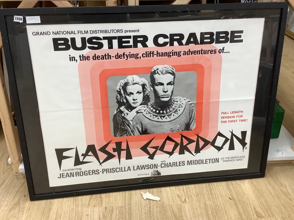 A large Flash Gordon poster, framed, 97 x 75cm